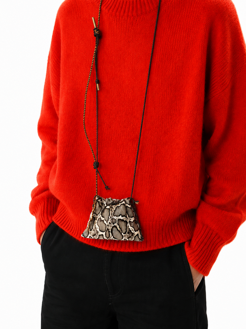 Poche Austin in PM “Sin”